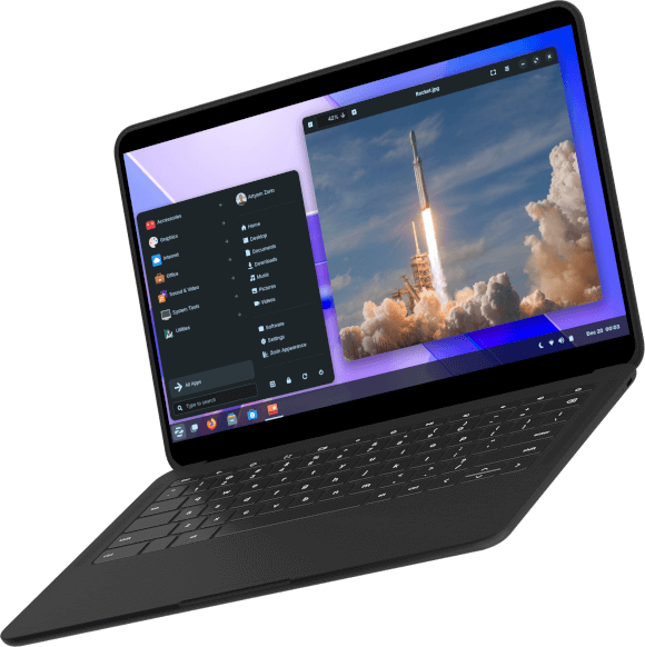 Laptop showing picture of a rocket